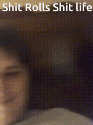 a blurry po of a boy in a dark room
