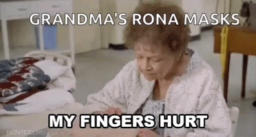 an older woman in white with text overlay that says grandma's rona masks my fingers hurt