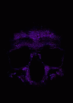 a pink skull in the dark with sunglasses on