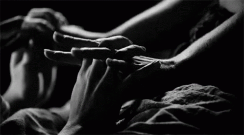 two hands reaching out to touch each other