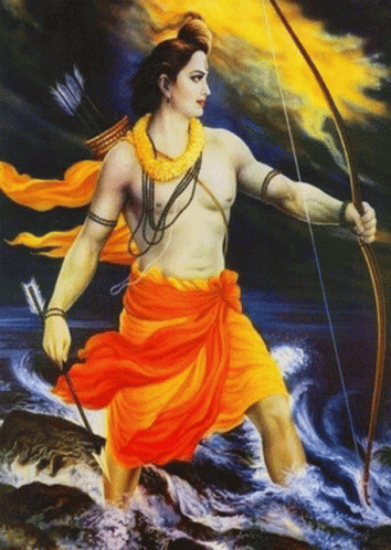 a man standing in water holding a bow and an arrow