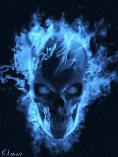 a skull in flames over a black background