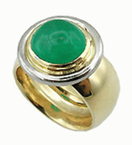 the ring has green and white circular decorations
