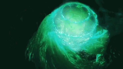 green colored substance with long, circular object on top