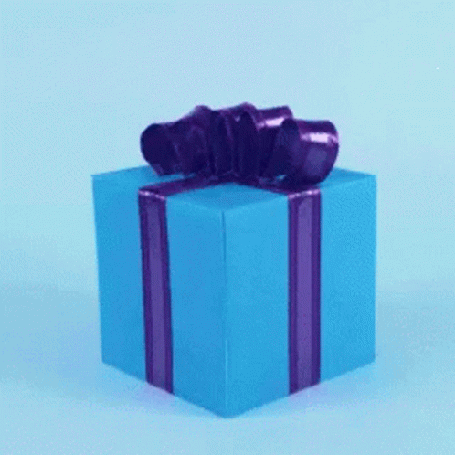 a purple and yellow gift box that has a bow on it