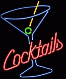a neon sign is lit up with the word cocktails