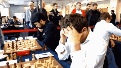 people are playing chess at the same time