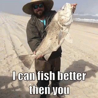 a person standing with a fish in his hand