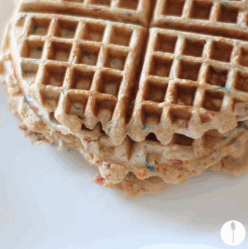a waffle that is covered in blue icing
