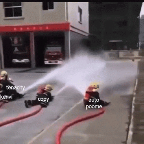 some people on fire hydrants and one is spraying the street