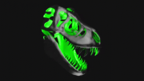 a green dinosaur head with it's mouth lit up