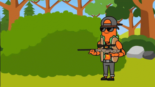 a man with an electric rifle on a green area