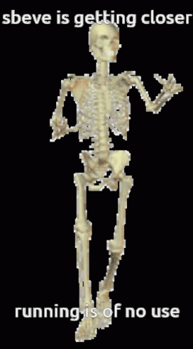 a skeleton holding a computer mouse in its right hand