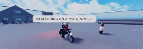 a motor bike sitting on a road with a sign saying i'm speeding on a motorcycle