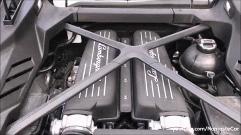 the inside workings of a car with the engine exposed