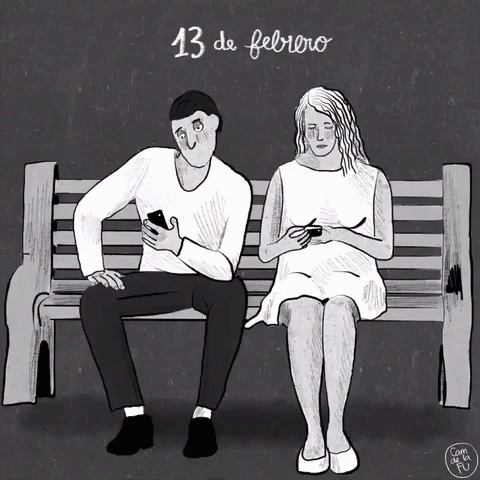 a woman and a man are sitting on a bench