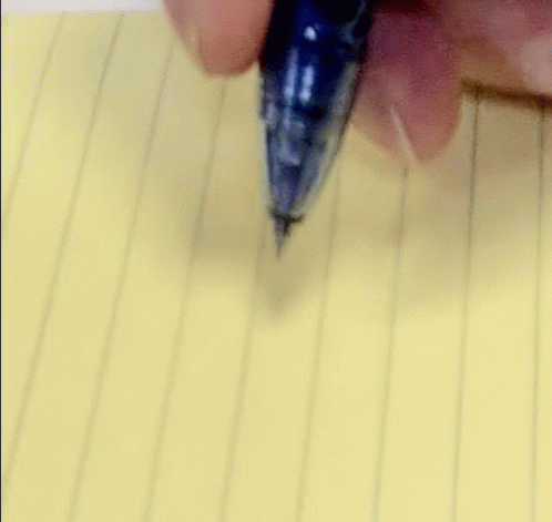a po of a fountain pen being pointed at soing