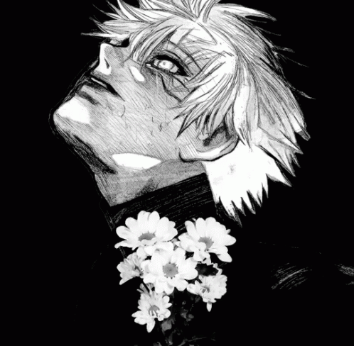 a black and white po of a person with flowers