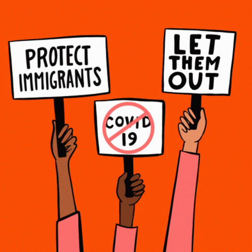 three people holding signs with the words protect immigrants