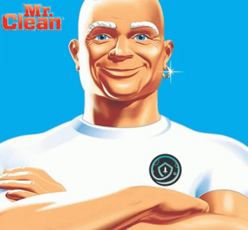 blue man in white and black shirt with arms folded