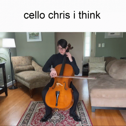 a man in a brown shirt is playing cello