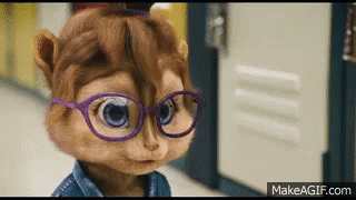 the blue doll has eyeglasses and a brown jacket on
