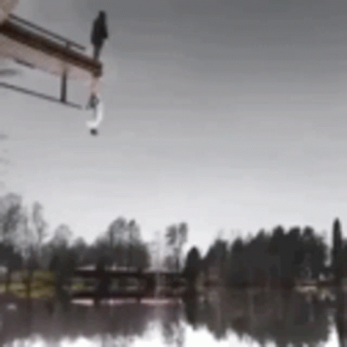 an airplane flies past a boat on the water
