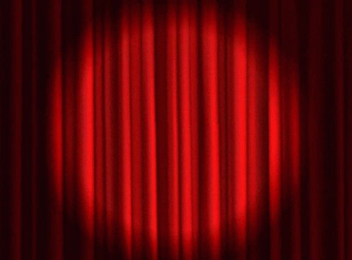 an image of a dark blue stage curtain