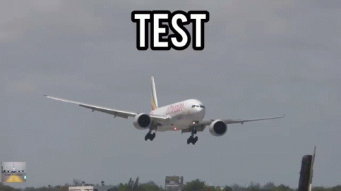 an airplane is in the air with the words test in it