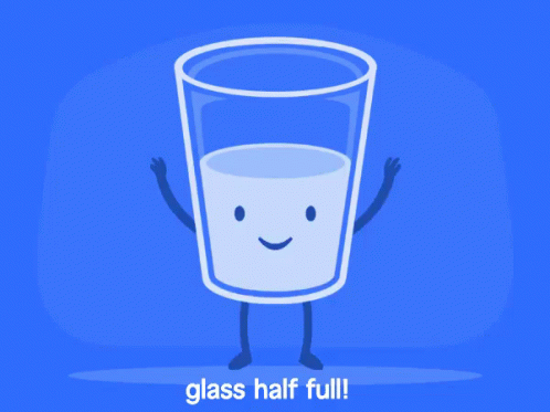 an image of a glass half full on an orange background