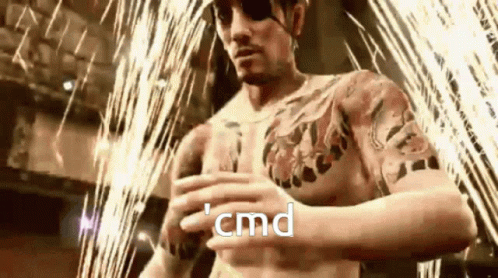 a man standing in front of a firework with the words cmd written in white