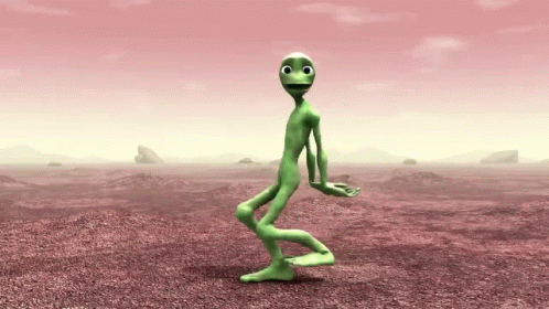 a cartoon alien standing in the desert
