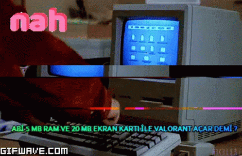 the old computer is shown as well as a person typing