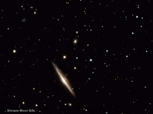 a comet is shown against the black sky