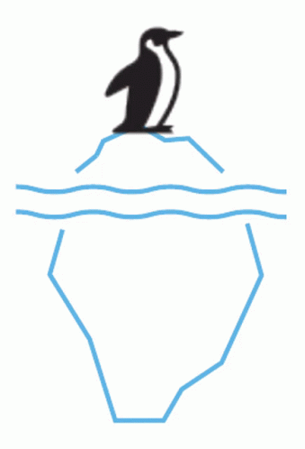 a penguin sitting on top of a small tip