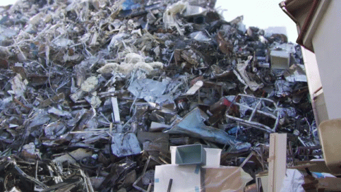 a large amount of crushed objects piled high up