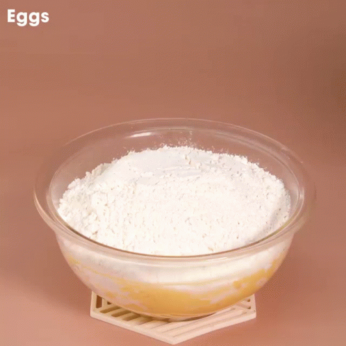 egg flour and other ingredients placed in a bowl