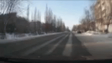 an image of a blurry street in winter