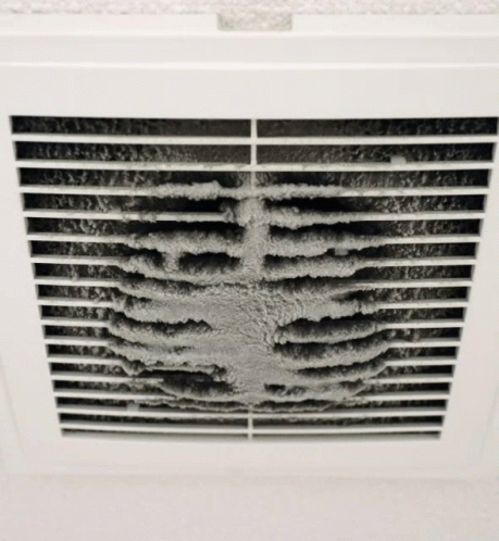 a small window type heater with a white background