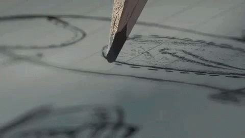 a close up of a pen and a paper