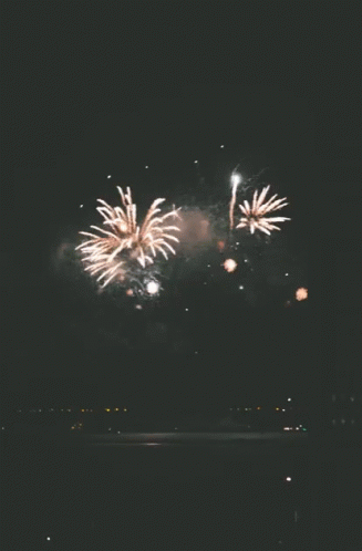 a fireworks show being performed with multiple lights