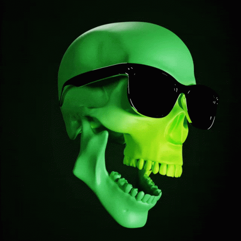 a skull wearing sunglasses and a green glow