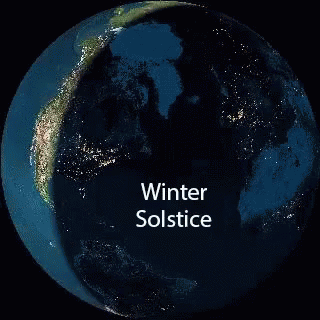 a planet with the word winter solstic in white lettering