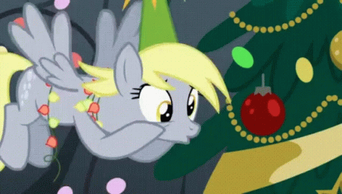 a cute little pony next to a christmas tree