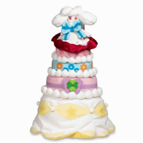 three tier cake that has white and blue decorations on it
