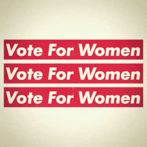 blue sign reading vote for women in front of a white background