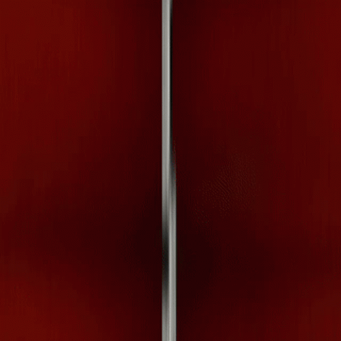 a closeup image of a very tall street pole