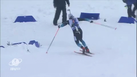 two cross country skiers in the snow on skis