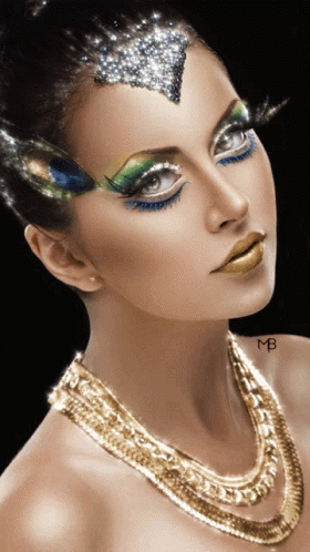a woman with jewelry and an unusual face make - up