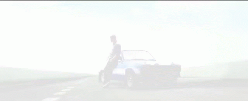 a car driving down a highway with its doors open